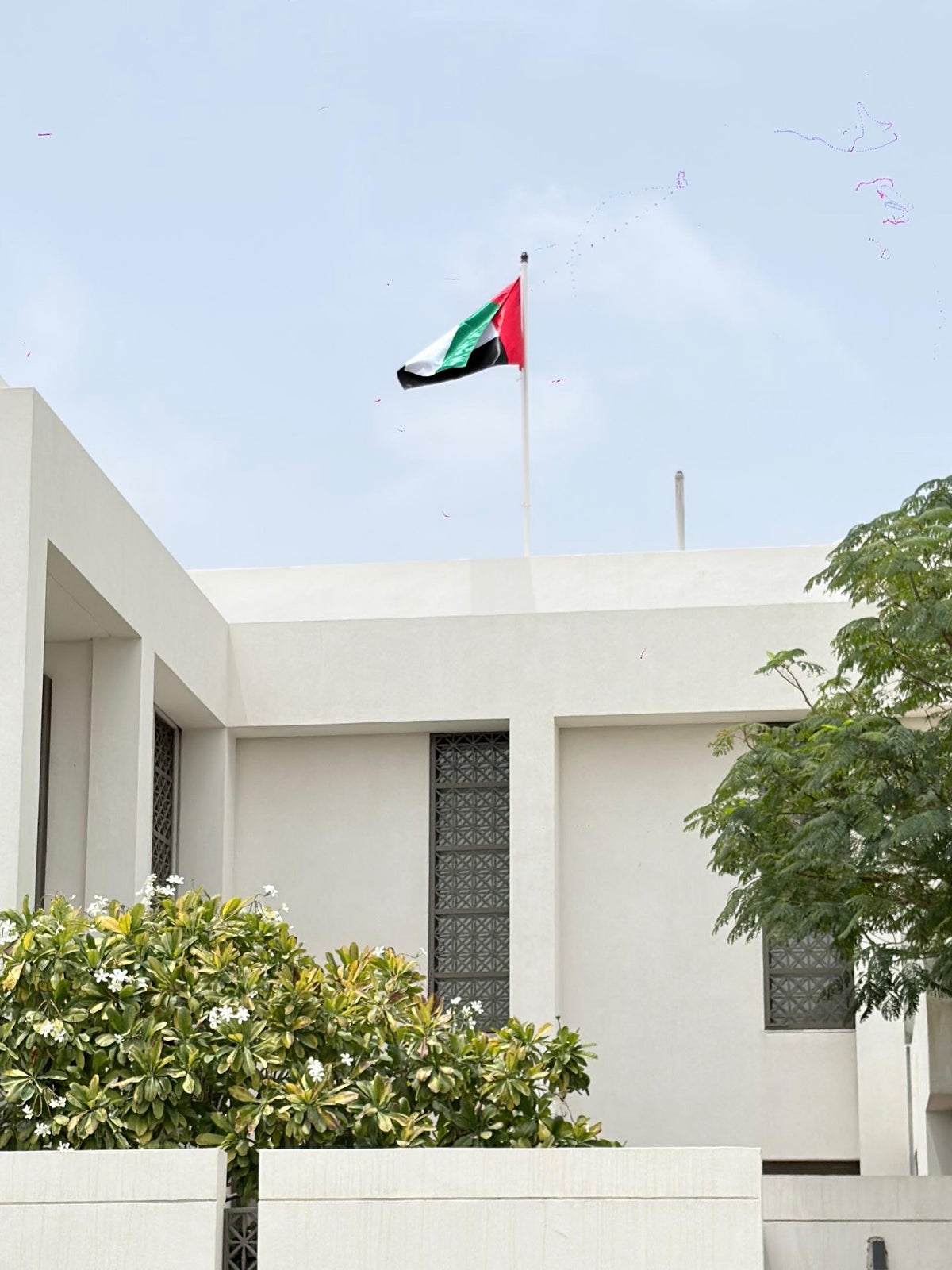 UAE flag on rooftop flag pole with clamp, Dubai