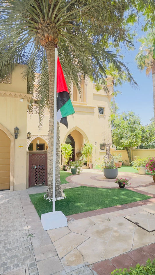 4 m freestanding flag pole with UAE flag and weighted base