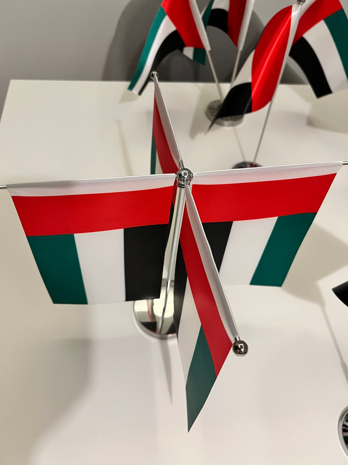 Quadruple desk flag set with gold stand